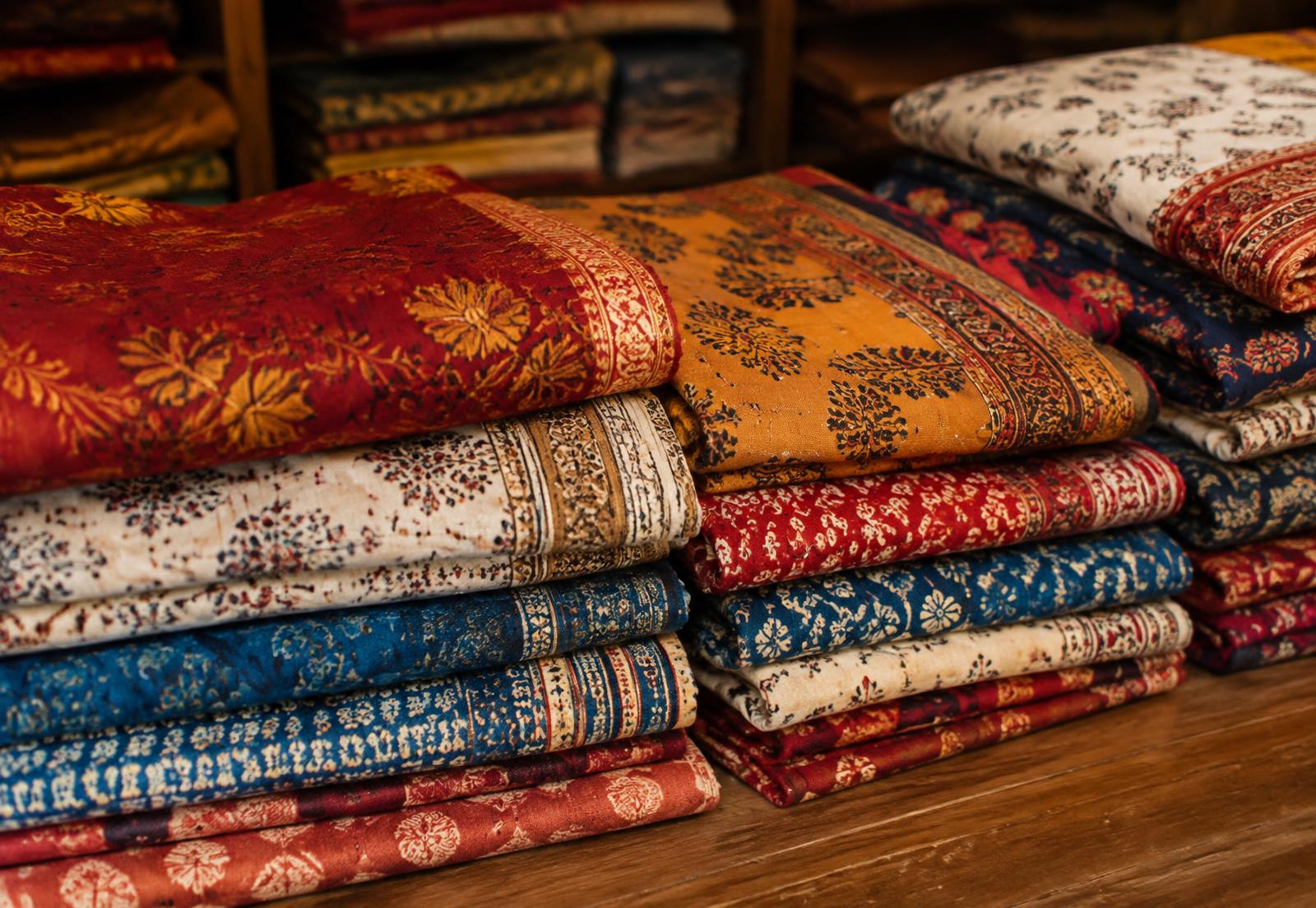 Stacks of block-printed South Asian fabrics